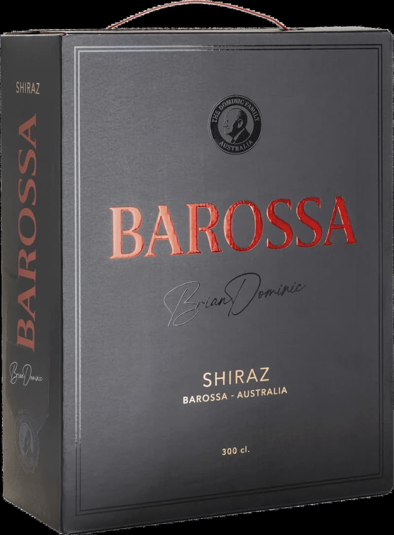 Ett glas rött Barossa Shiraz-vin mot en mörk bakgrund.