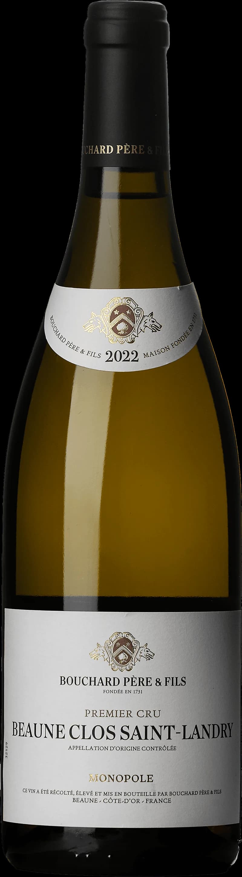 Flaska och glas med Beaune Clos Saint-Landry Premier Cru vitt vin från Bourgogne.