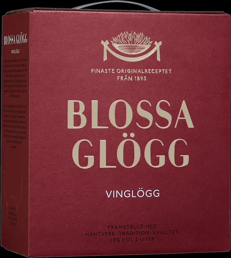 Flaskor med Blossa glögg och glühwein på ett bord med juldekorationer.