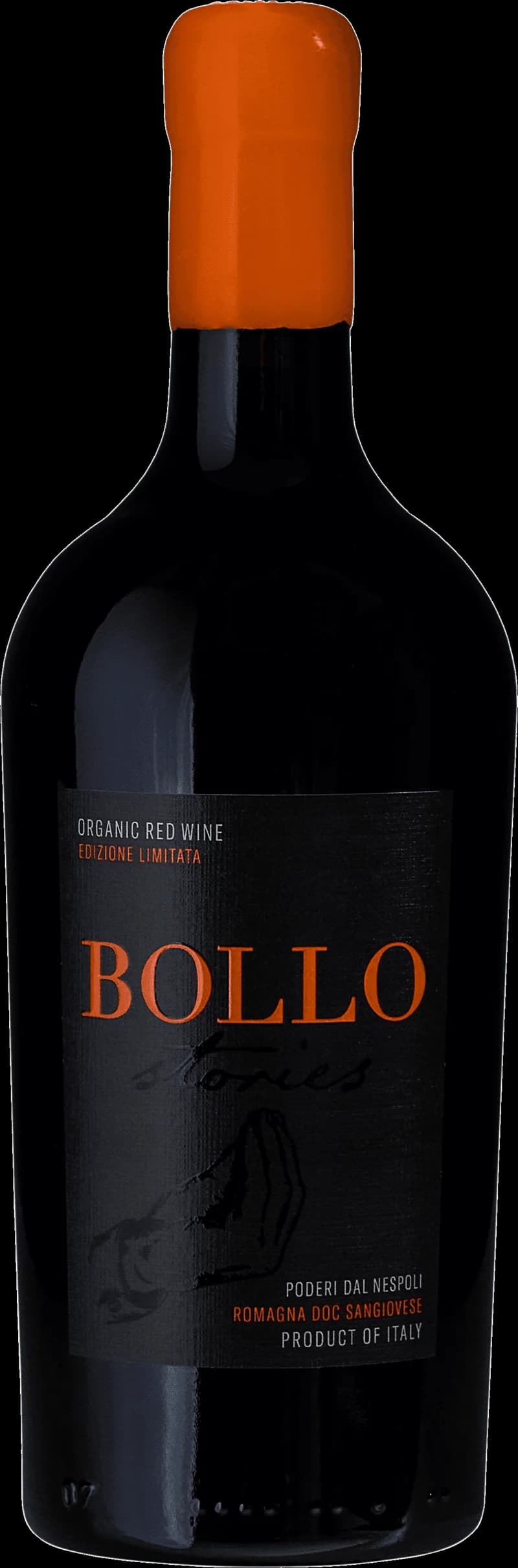 Bollo rött vin i ett vinglas mot en mörk bakgrund.
