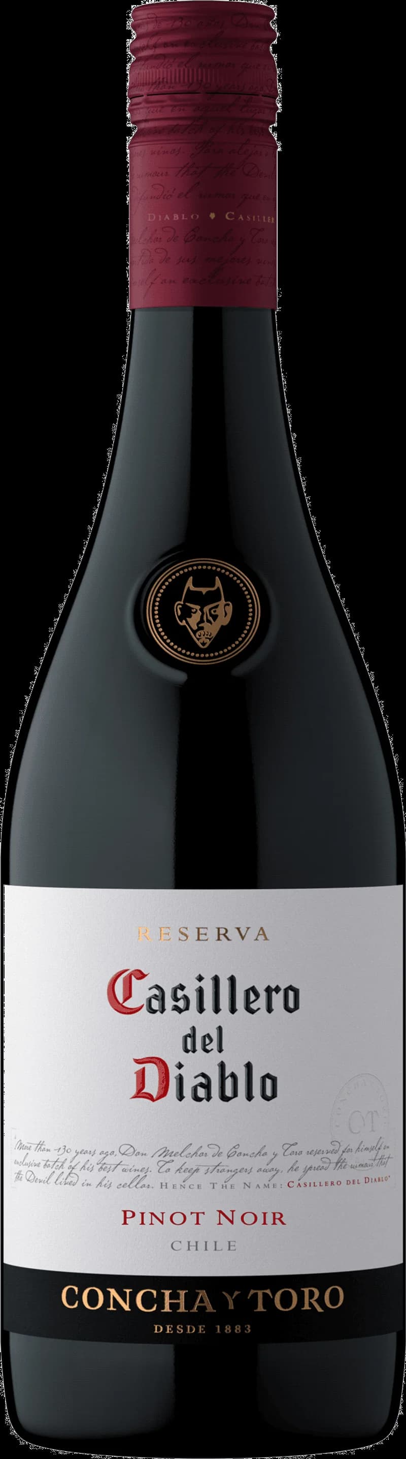 Flaska av Casillero del Diablo rött vin mot mörk bakgrund.