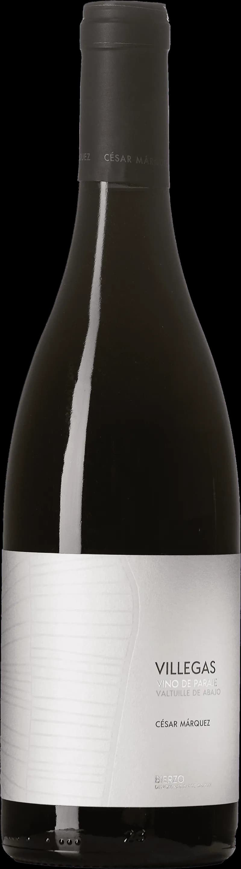 César Marqués Pérez rött vin i ett vinglas mot en mörk bakgrund