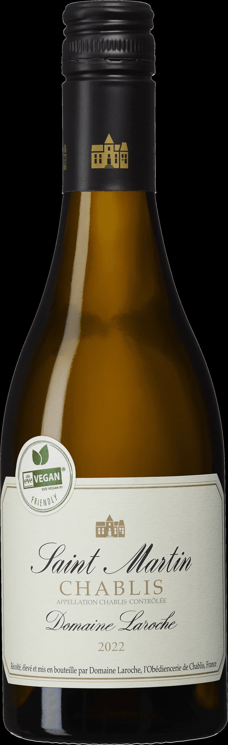 Ett glas chablis vitt vin på ett bord.