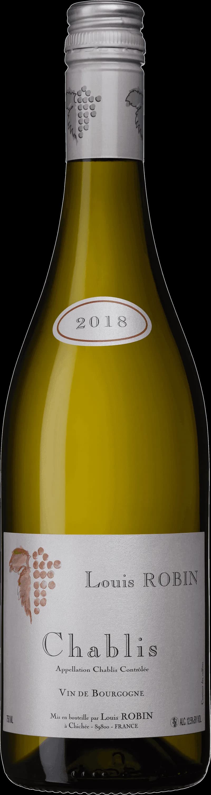 Ett glas Chablis vitt vin på ett bord.