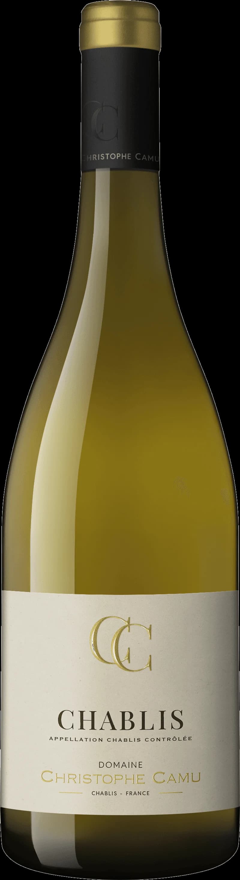 Flaska med Chablis vitt vin på ett bord
