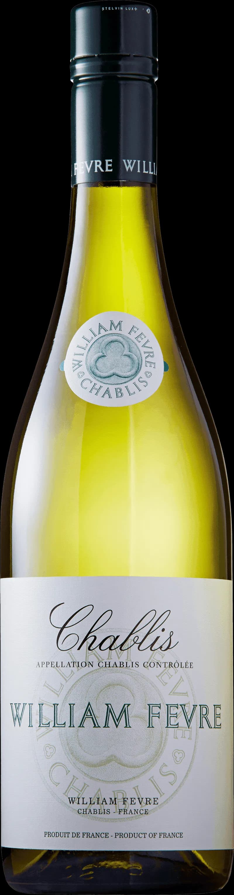 Ett glas Chablis vitt vin stående på ett bord.