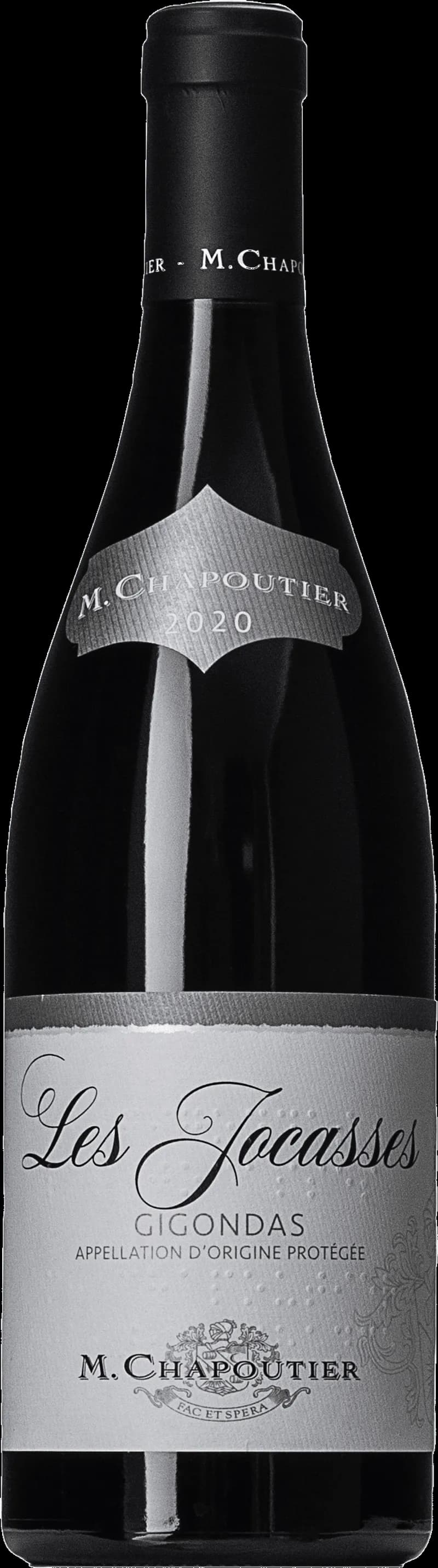 Flaska med Chapoutier rött vin mot en mörk bakgrund.