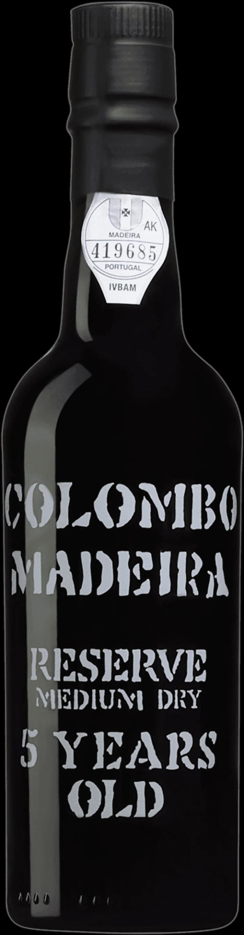 Flaska och glas med Colombo Madeira starkvin på ett bord.