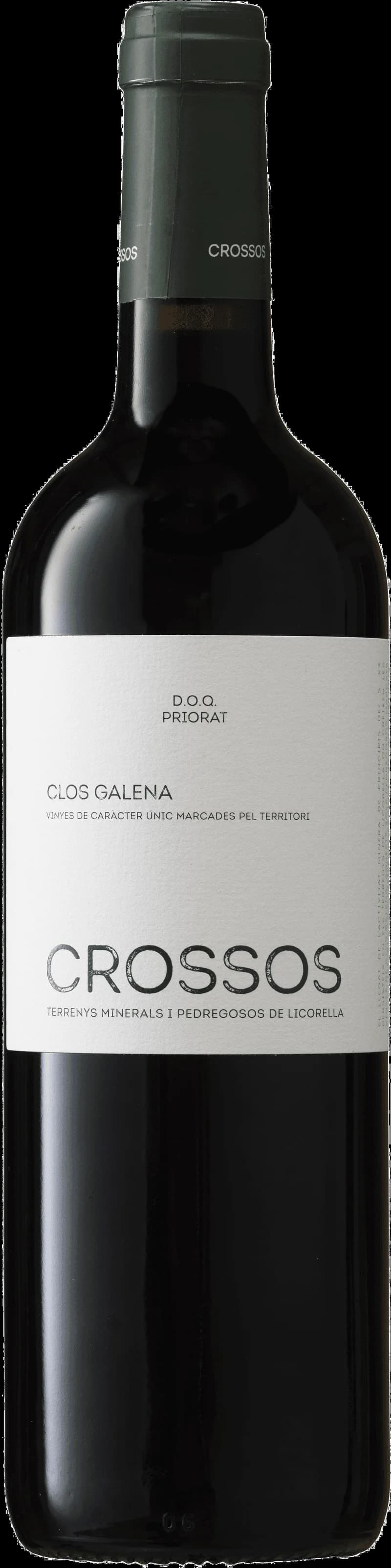 Flaska med Crossos rött vin på en bordsduk.