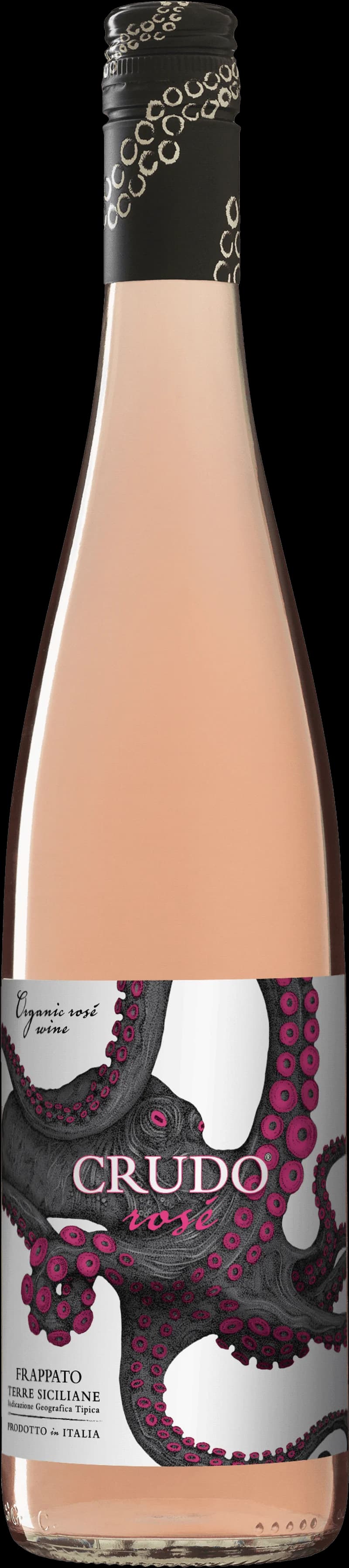 Tallrik med crudo och ett glas rosévin på ett träbord.