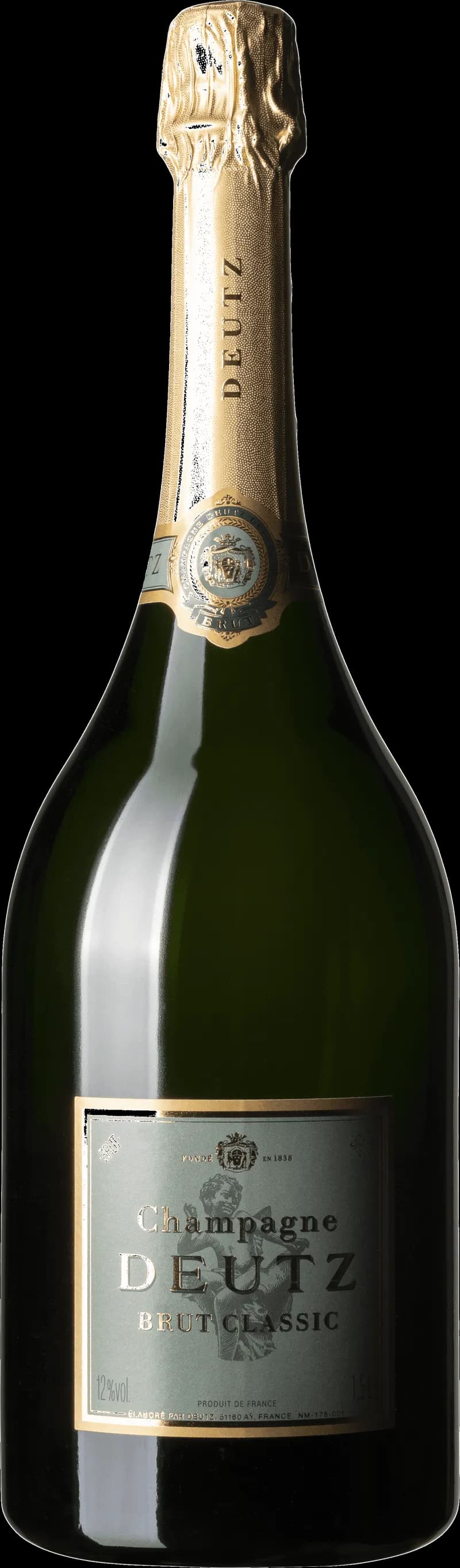 Flaska och glas med Deutz mousserande vin på en elegant dukning.