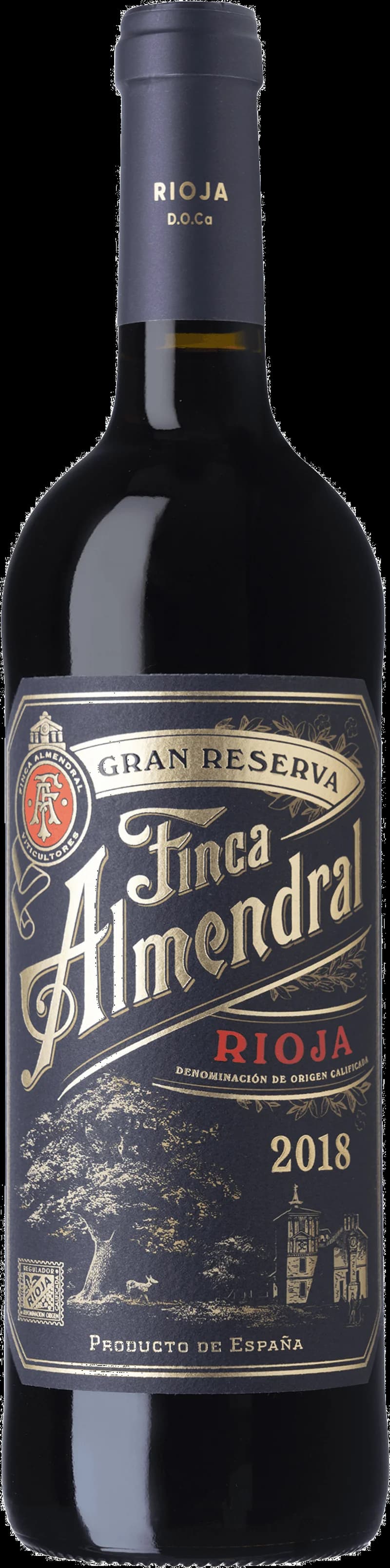 Flaska av rött vin från Finca Almendral på en rustik träbänk