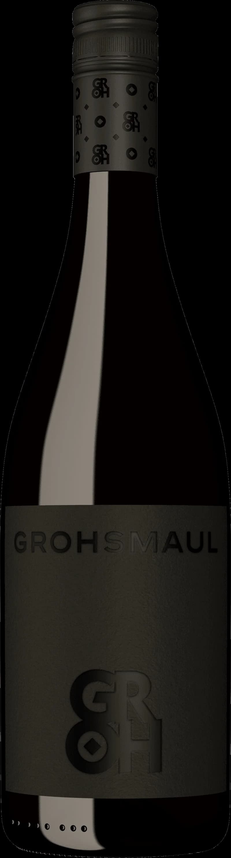 Närbild på ett glas rött vin med grön bakgrund