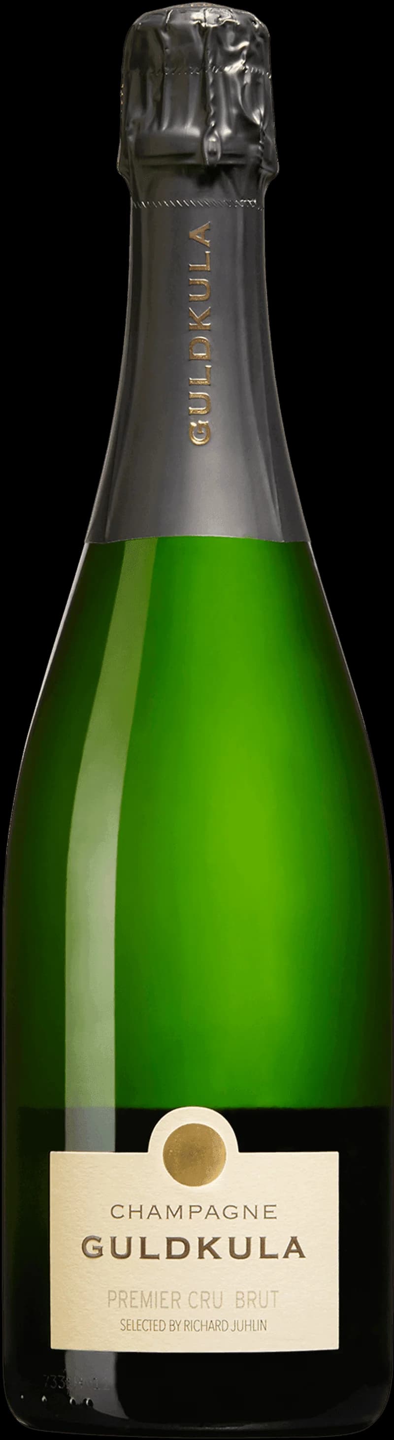 Guldkula mousserande vin i ett elegant glas