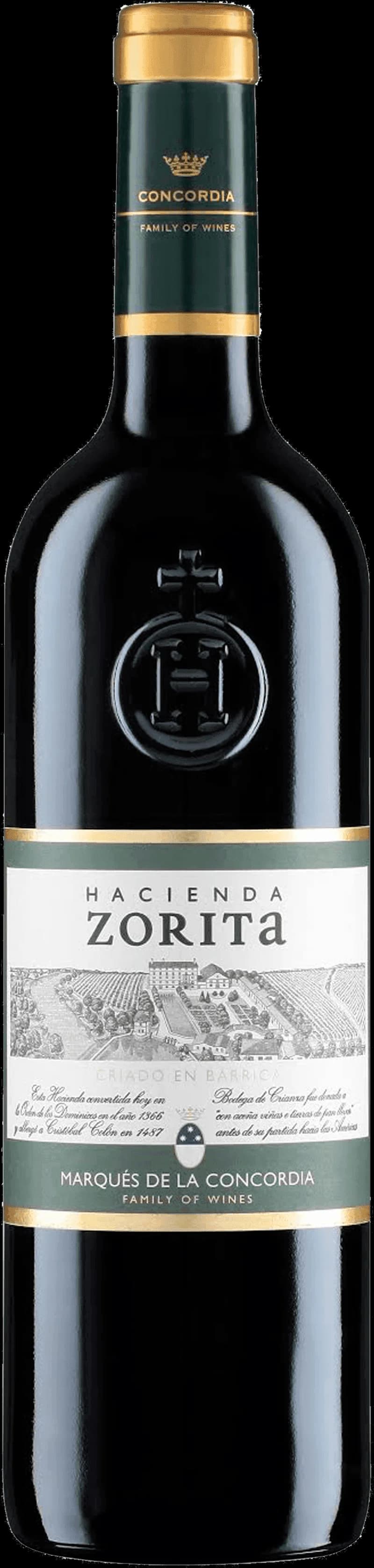 Flaska av Hacienda Zorita rött vin mot en mörk bakgrund.