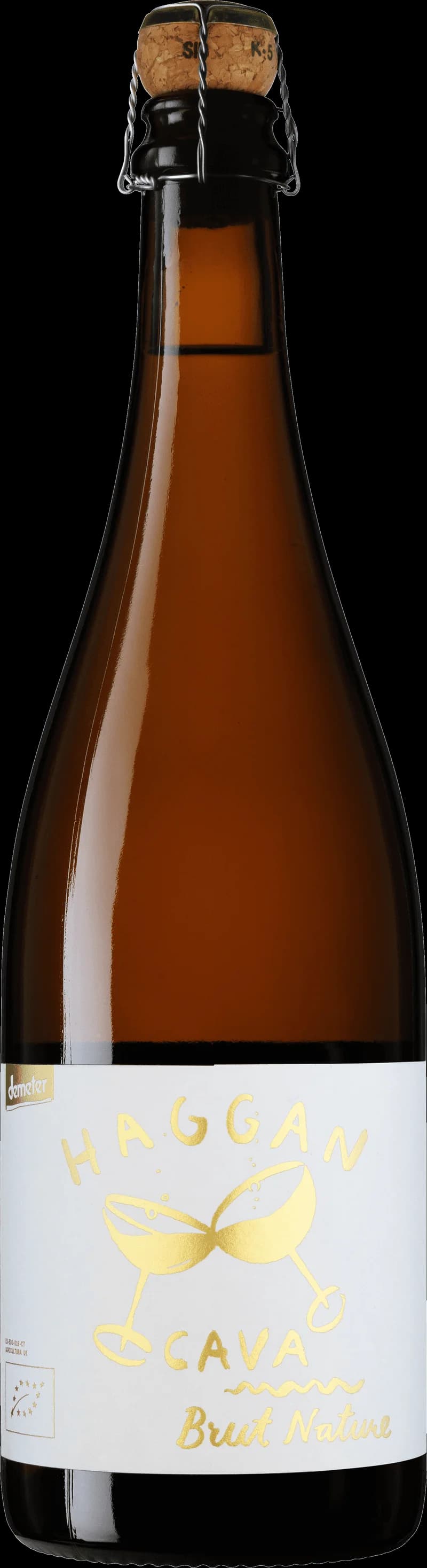 Haggan mousserande vin i ett elegant glas med bubblor.
