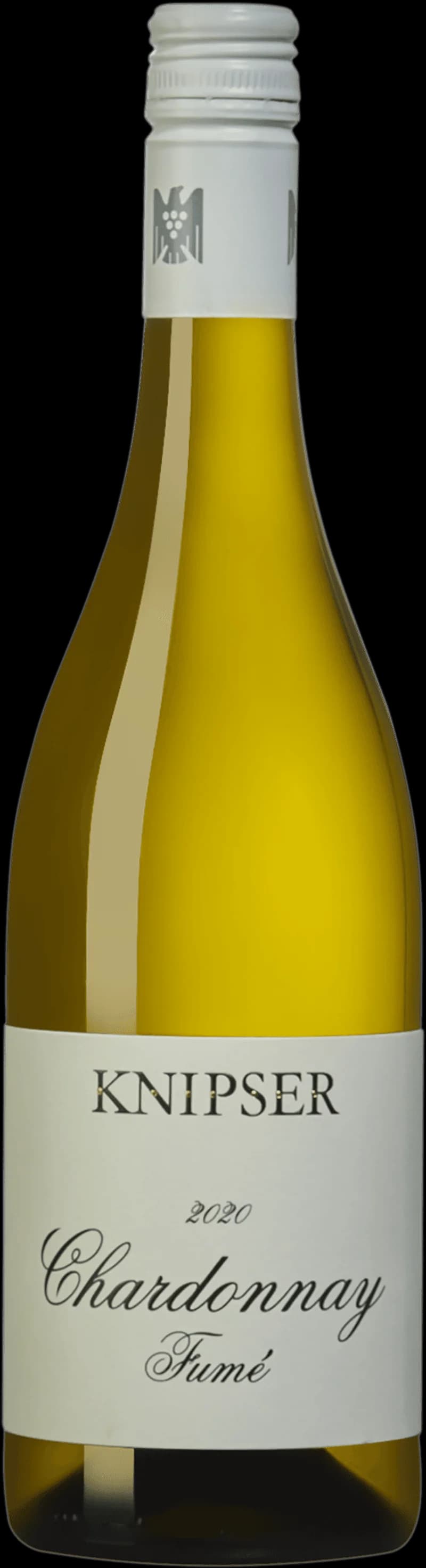 Ett glas knipser vitt vin på ett bord