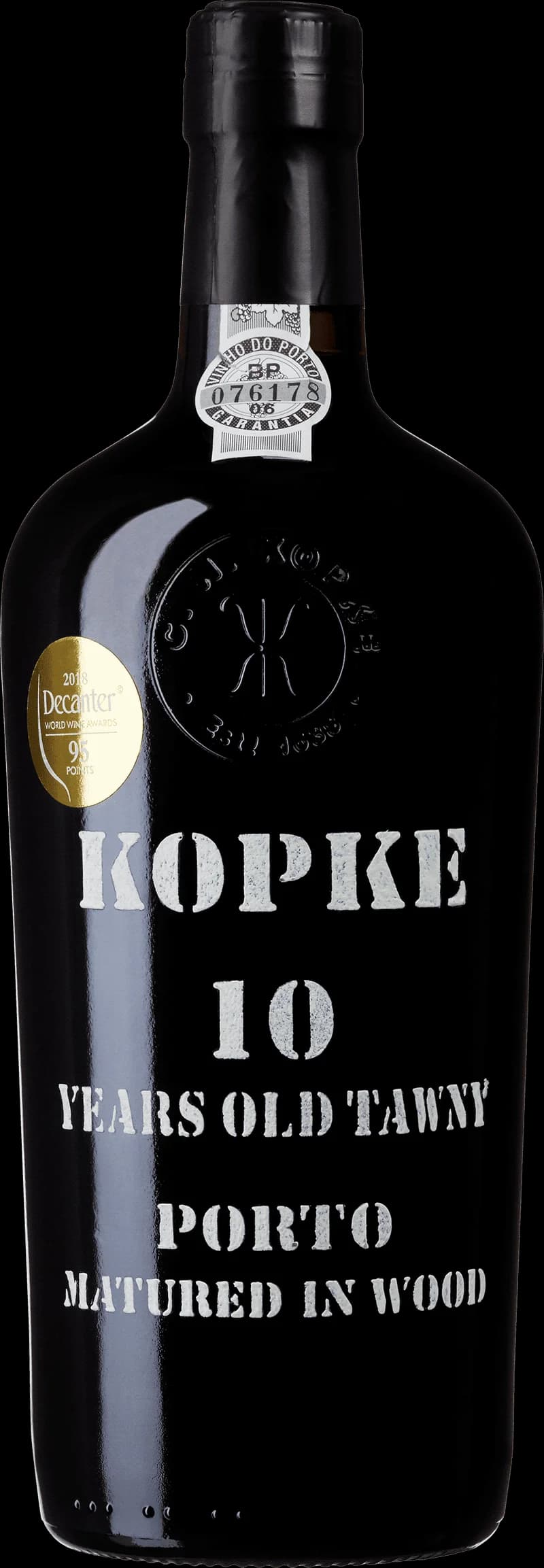 Flaska av Köpke starkvin mot en mörk bakgrund.