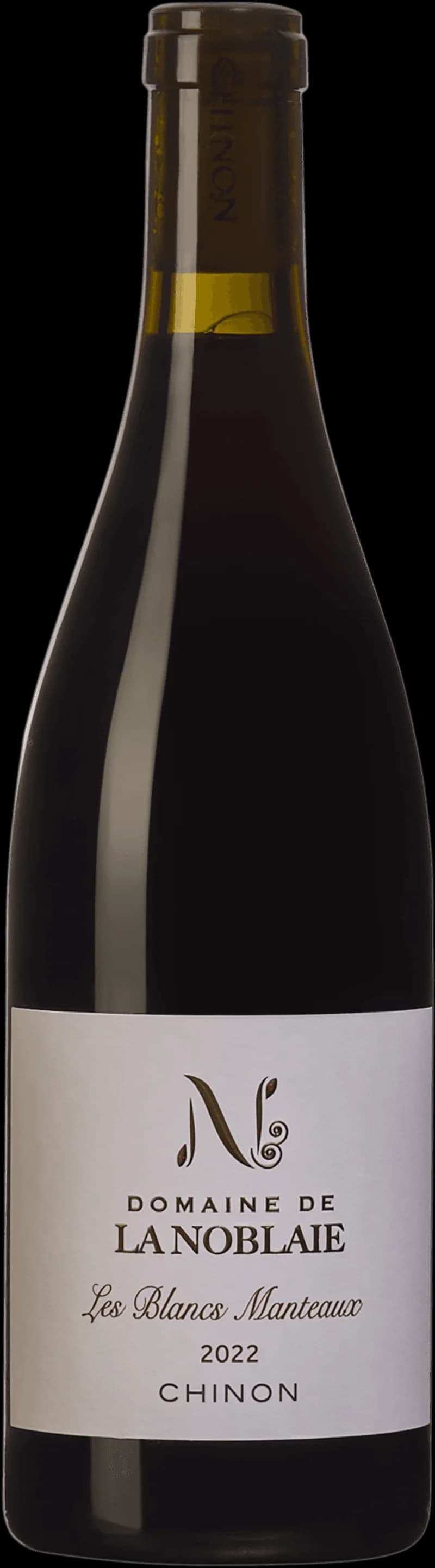 Flaska av rött vin Les Blancs Manteaux mot en mörk bakgrund.