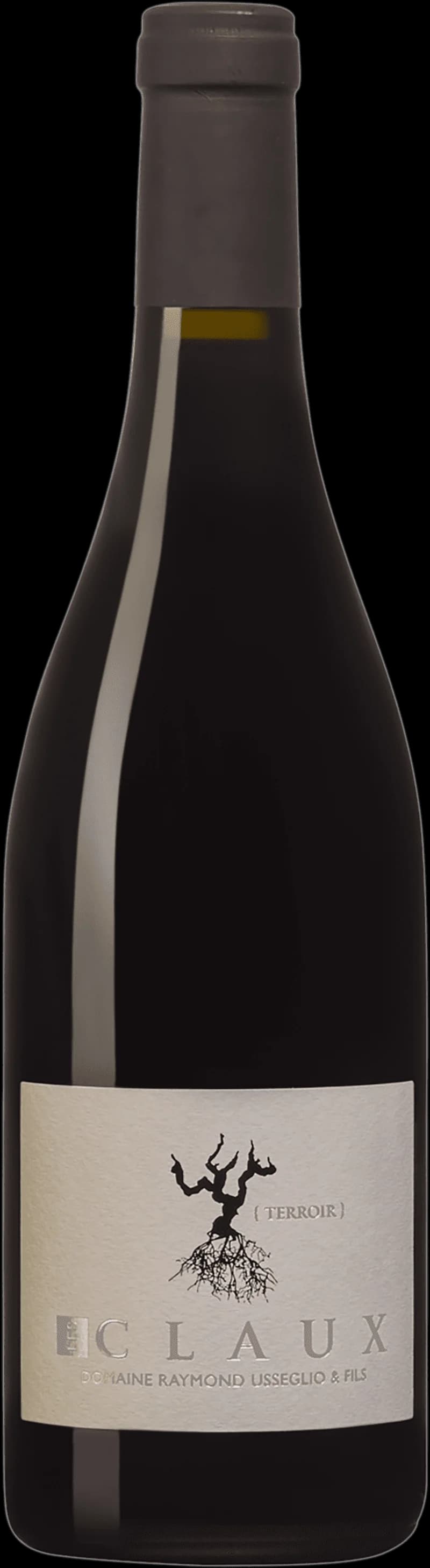 Flaska av rött vin Les Claux mot en mörk bakgrund.