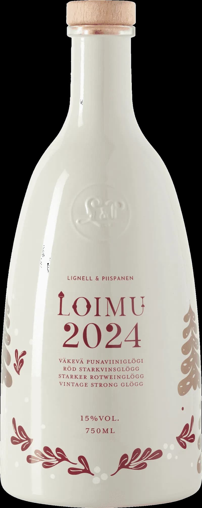 Två glas med varm glögg och glühwein bredvid en flaska Loimu.