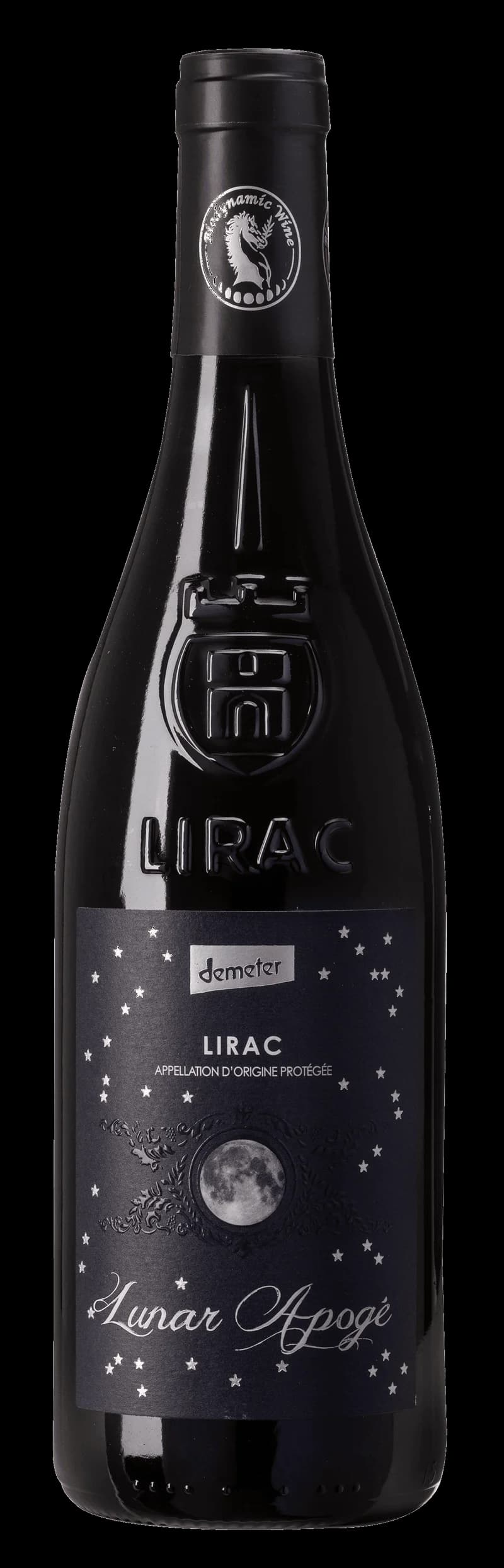 Lunar Apoge rött vin i ett vinglas mot en mörk bakgrund.
