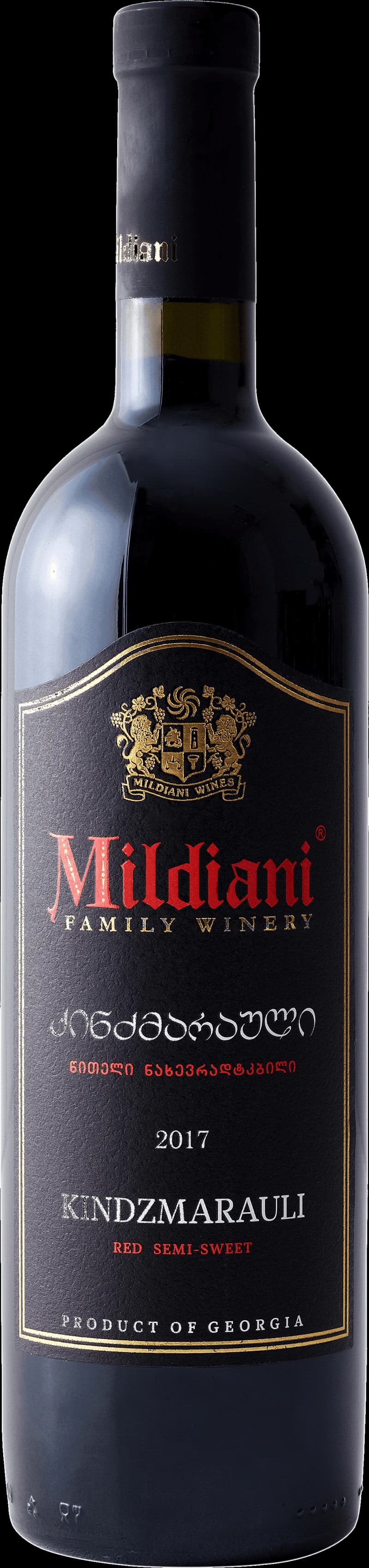 Flaska av rött vin från Mildiani på en bordduk