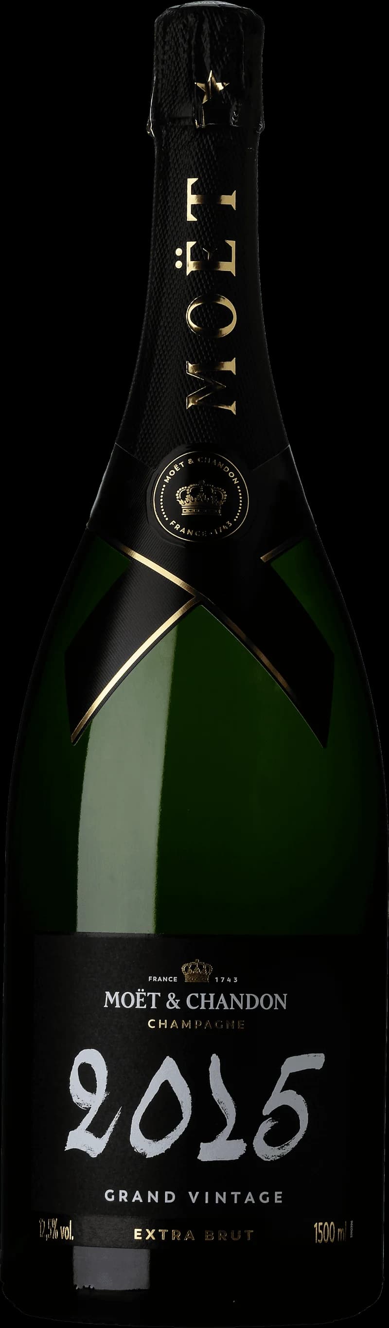 Flaska med Moët & Chandon mousserande vin mot mörk bakgrund