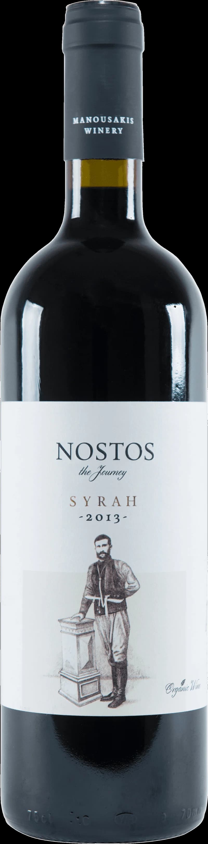 Nostos rött vin i ett vinglas på ett bord