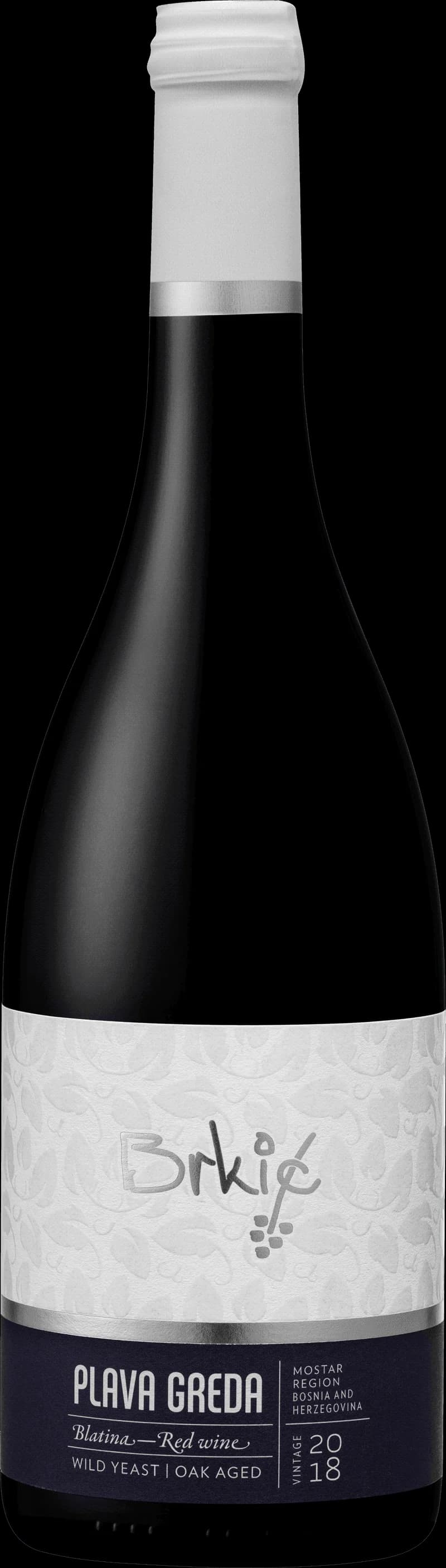 Flaska och glas med rött vin från Plava Greda