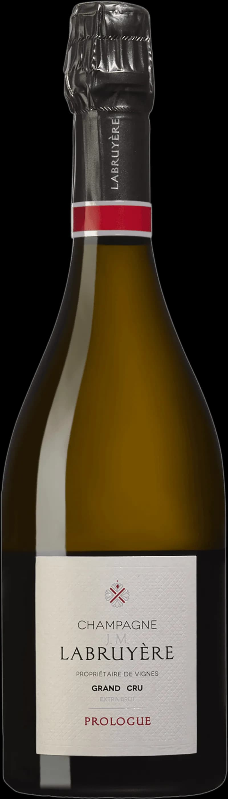 Prologue mousserande vin i ett elegant glas mot en mörk bakgrund.