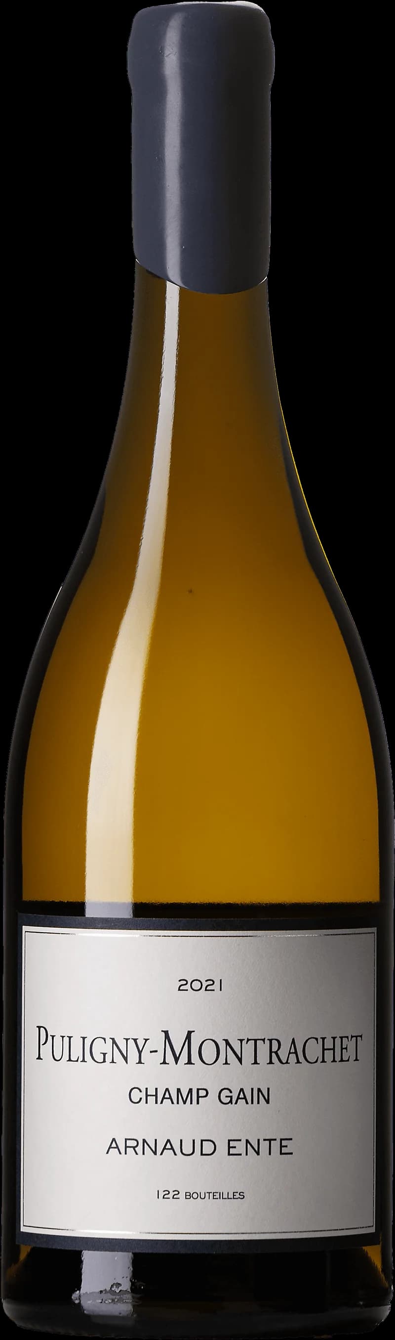Flaska med Puligny-Montrachet Premier Cru Champ Gain vitt vin från Bourgogne.