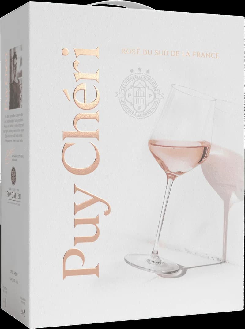 Flaska av Puy Chéri rosévin på en bordsservering.