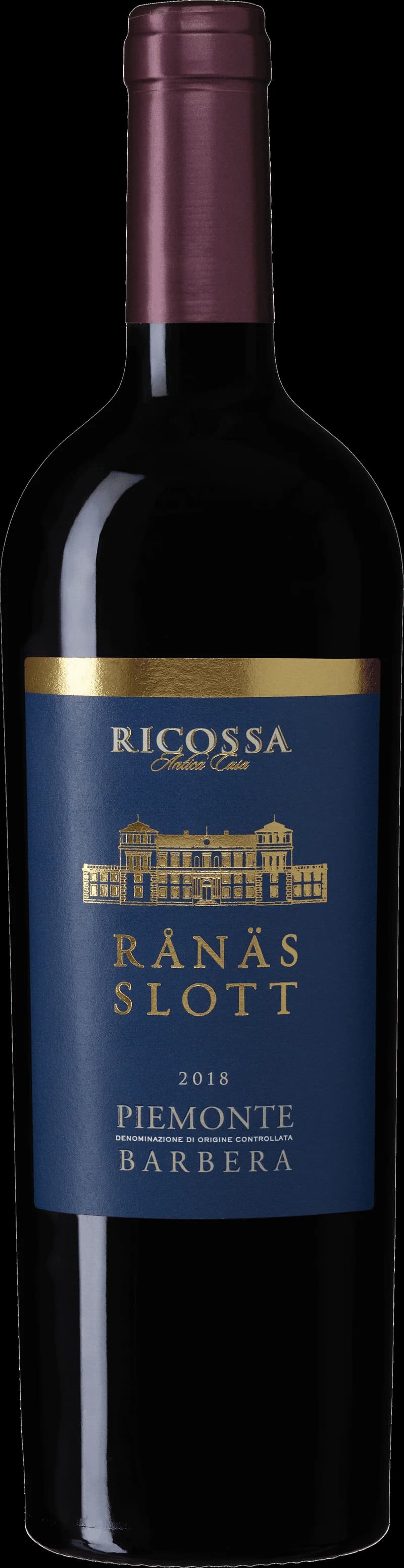 Flaska av Rånäs Slott rött vin på en bordsservering.