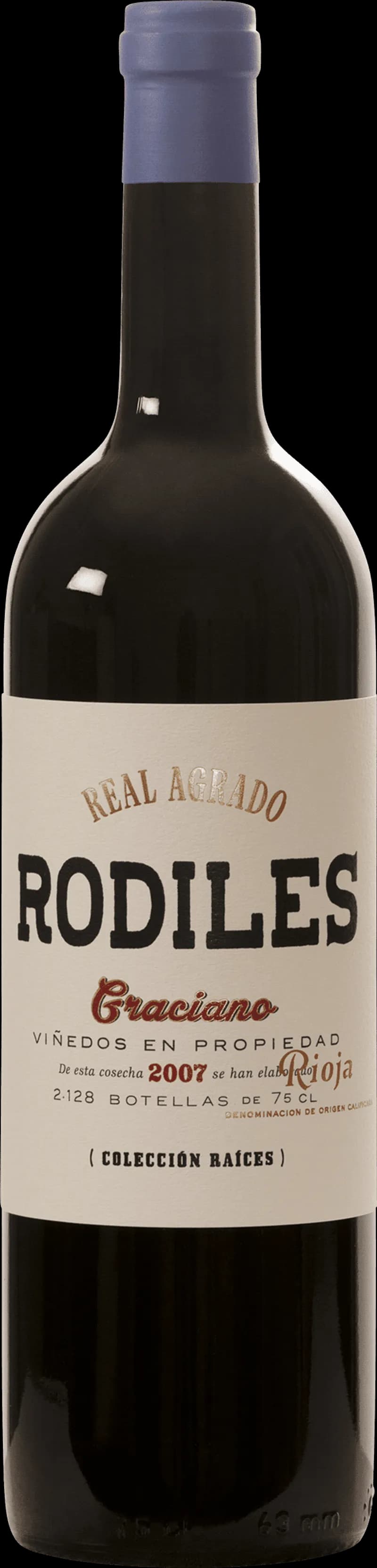 Flaska av Rodiles rött vin på en bordsservering.