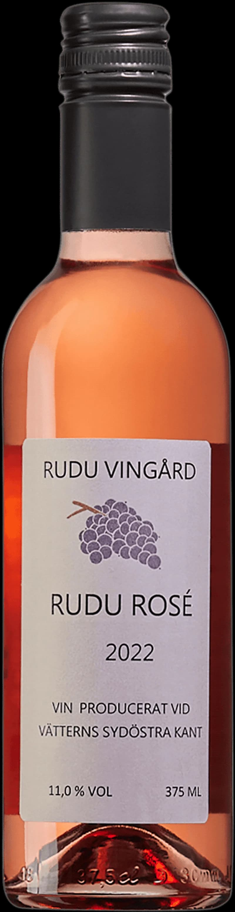 Flaska och glas med Rudu rosévin mot ljus bakgrund