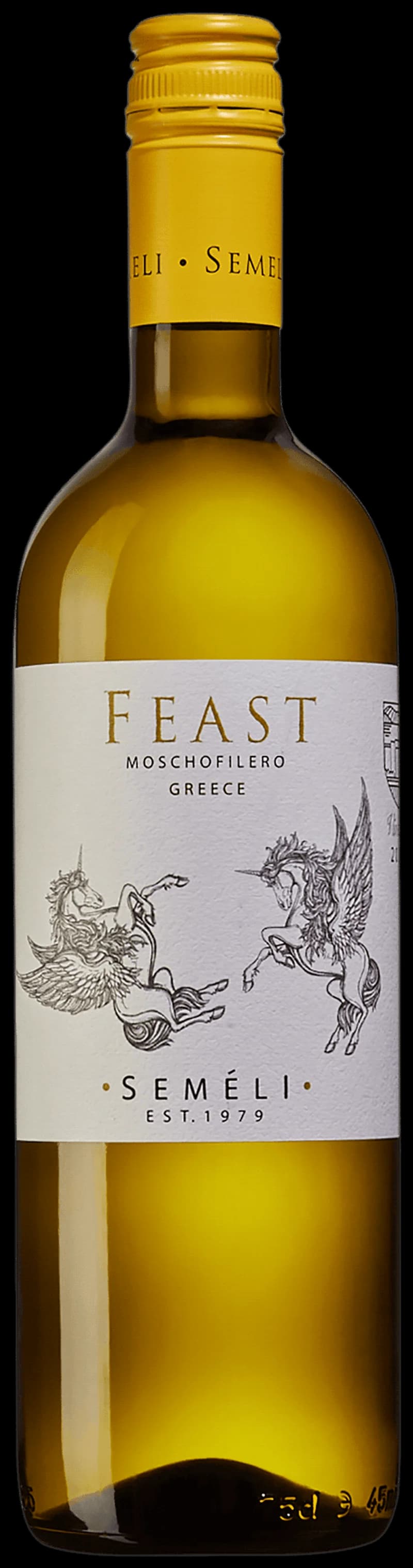 Flaska med Semeli Feast vitt vin på en dukad bordsyta.