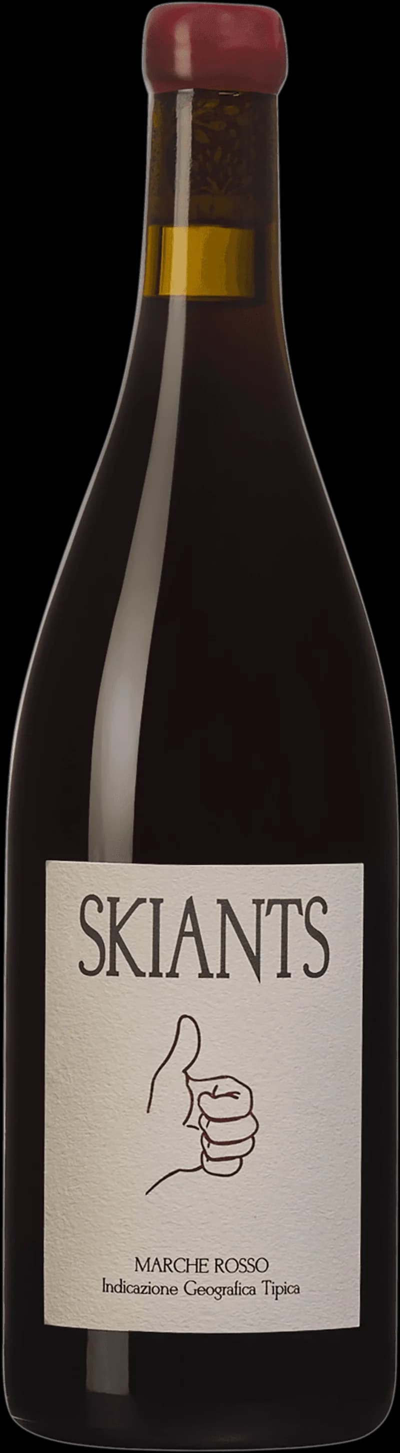 Ett glas rött vin på ett bord med mörk bakgrund.