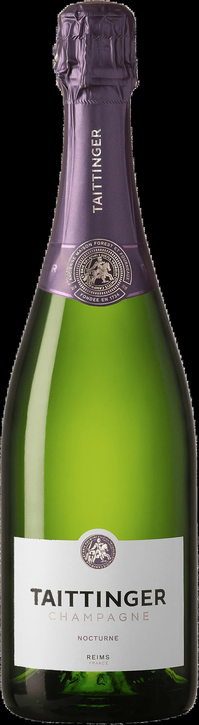 Flaska Taittinger mousserande vin mot mörk bakgrund