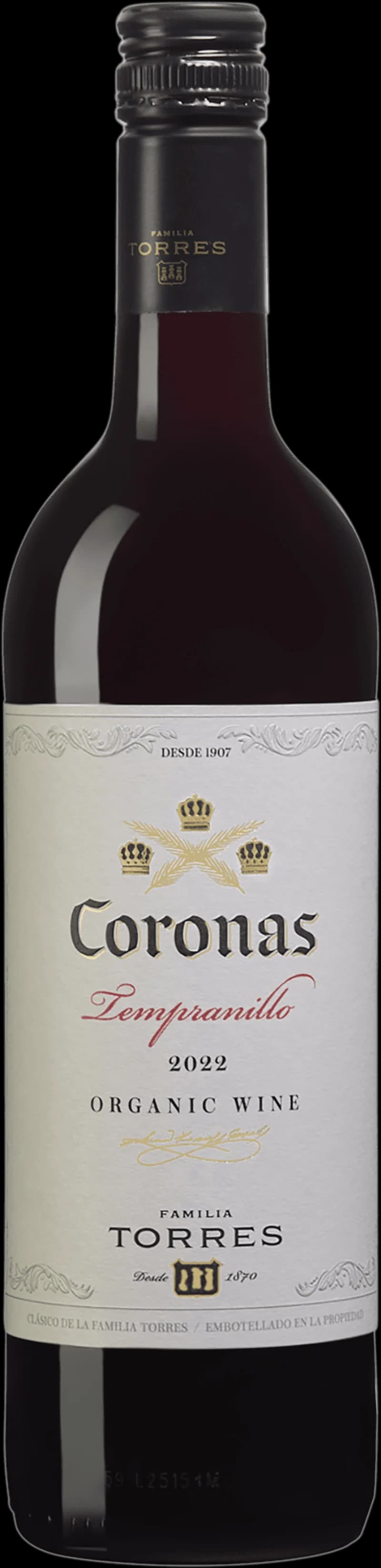 Flaska av Torres Coronas rött vin mot neutral bakgrund.