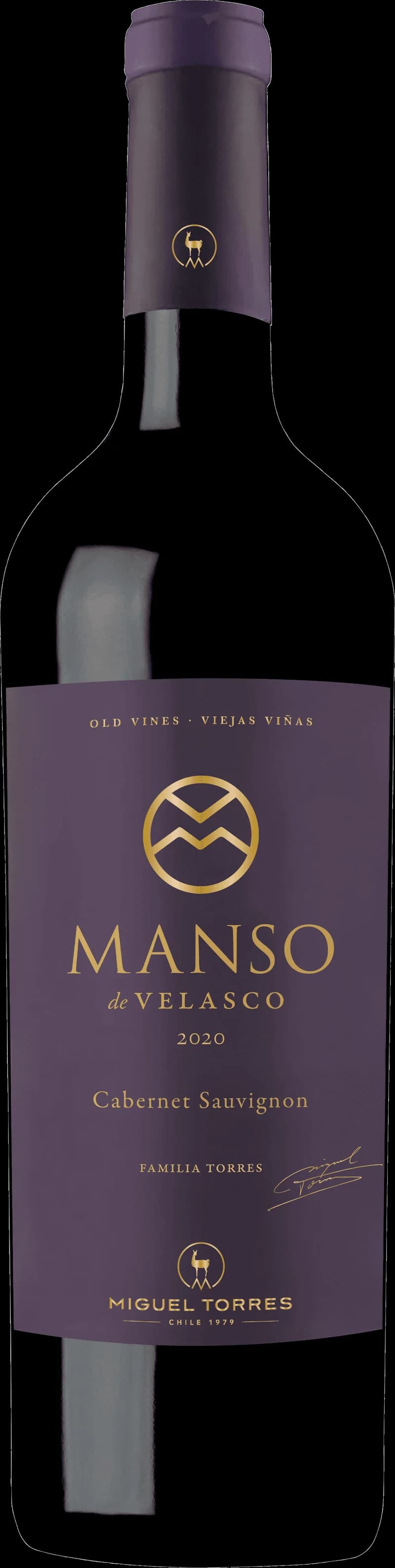 Flaska av rött vin Torres Manso de Velasco på en bordsservering.