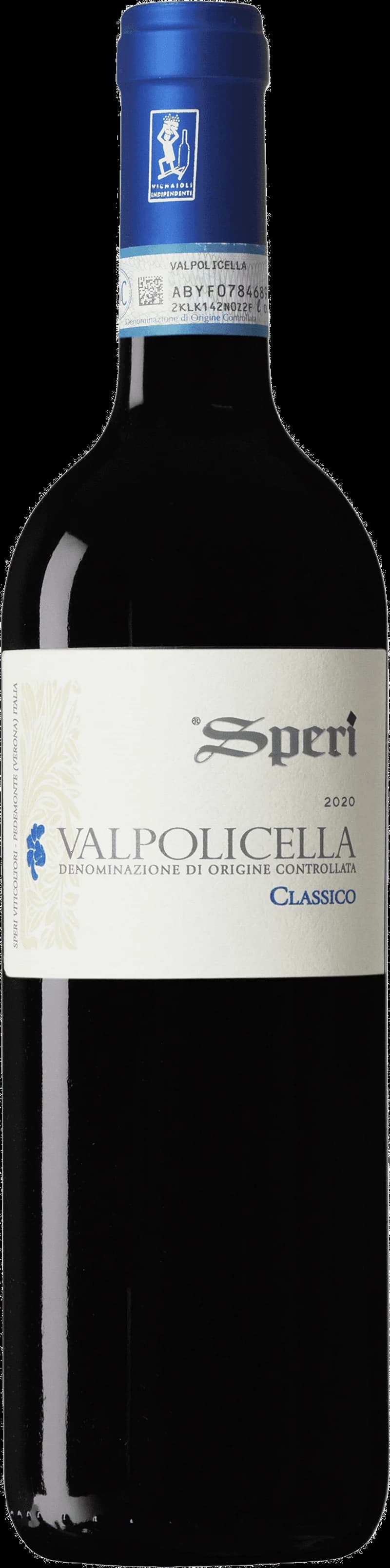 Ett glas rött Valpolicella-vin mot en mörk bakgrund.