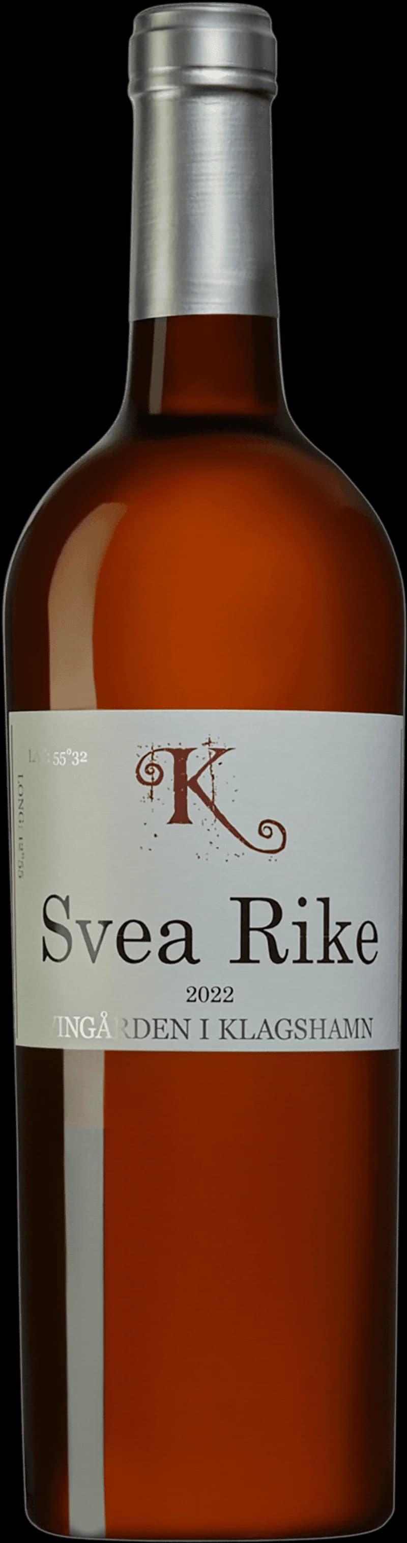 Vingården i Klagshamn med ett glas vitt vin i förgrunden.