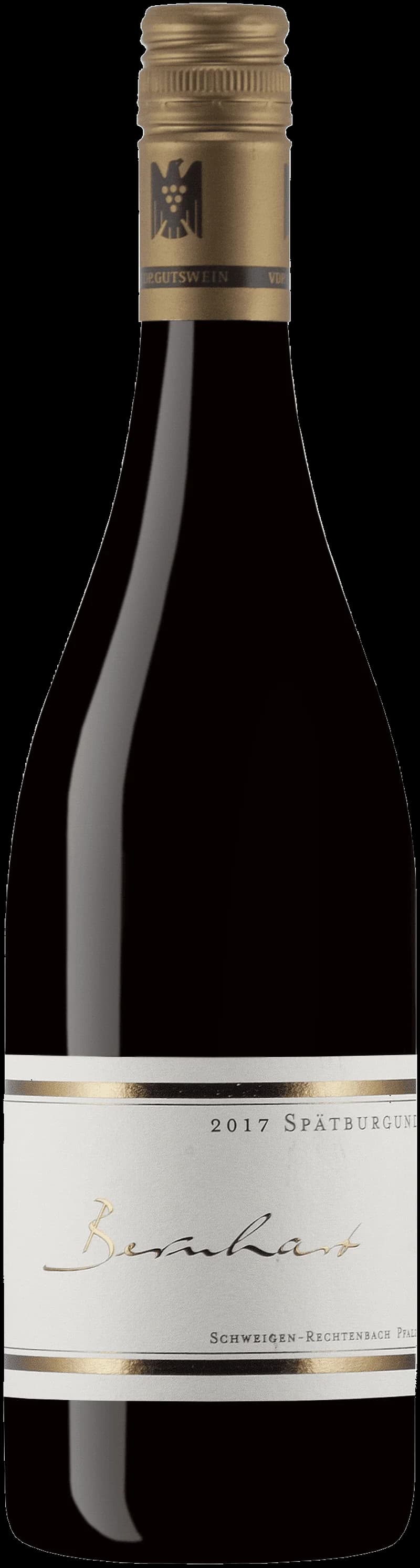 Flaska med rött vin från Weingut Bernhart på en bordsservering.