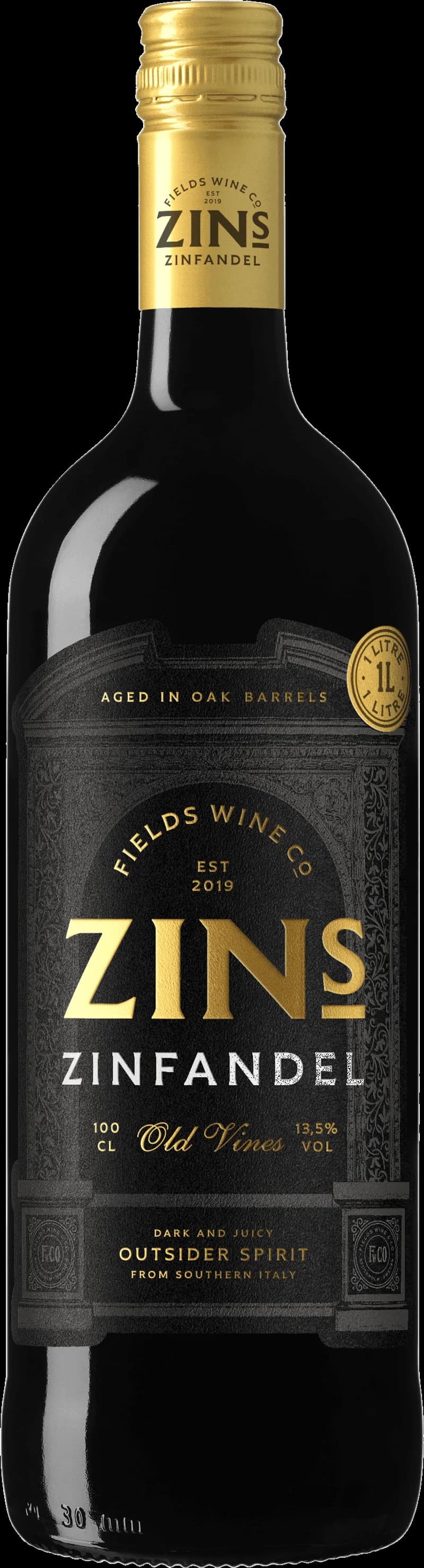 Flaska med rött Zinfandel-vin på ett bord