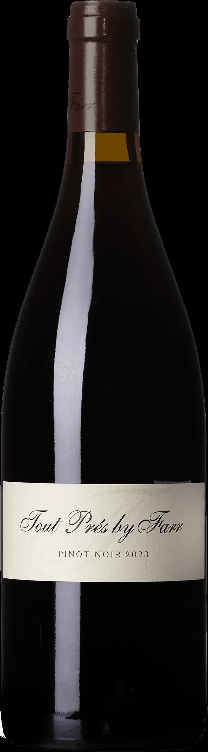 Flaska med By Farr rött vin på en bordsservering.