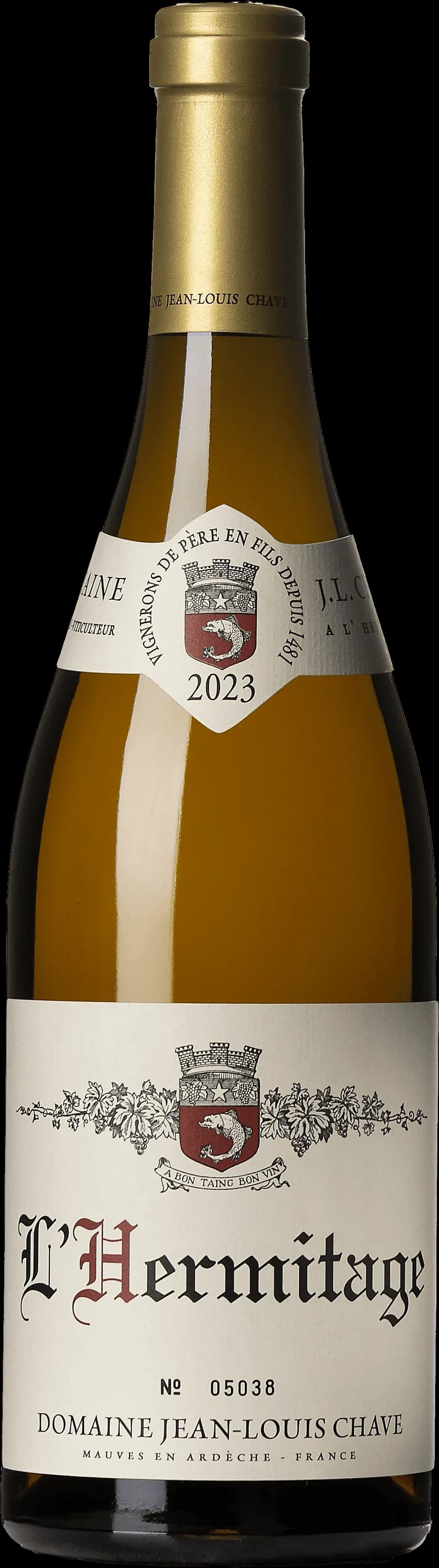 Flaska och glas med vitt vin av druvan Marsanne från appellationen Hermitage i norra Rhône.