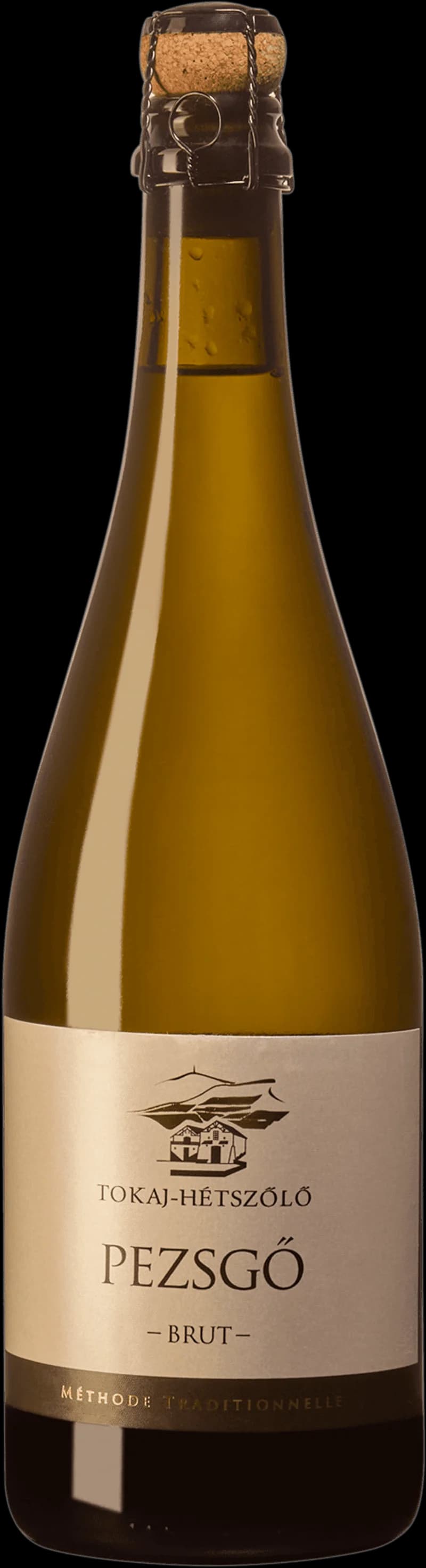 Flaska Tokaj Hetszolo mousserande vin från Ungern, fotograferad mot ljus bakgrund