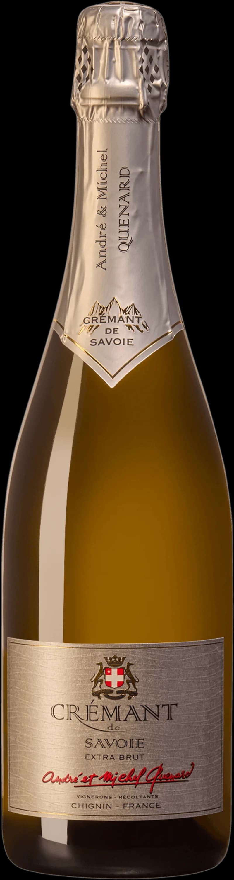 Flaska och glas med mousserande Crémant de Savoie-vin mot ljus bakgrund