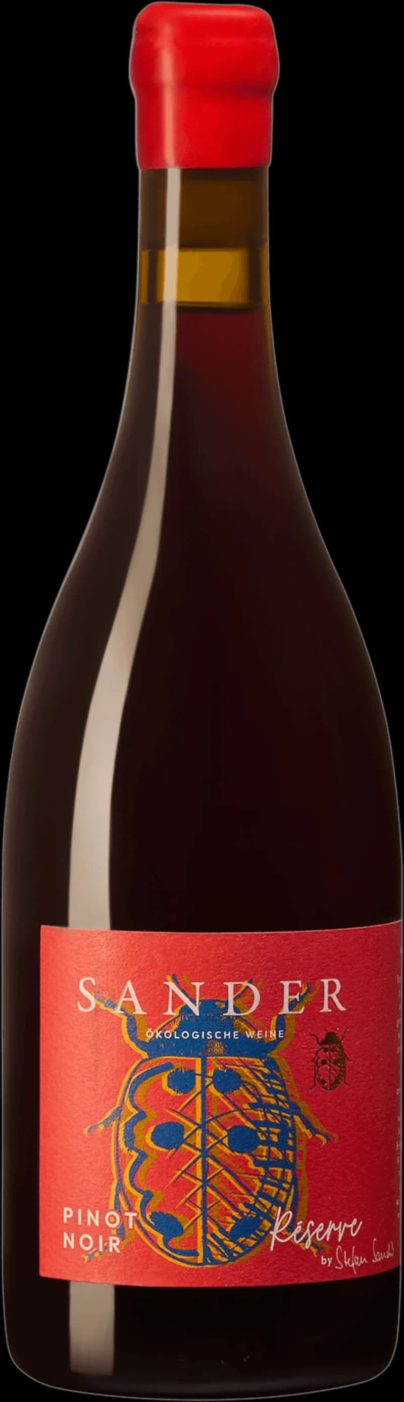Sander håller ett glas rött vin i handen